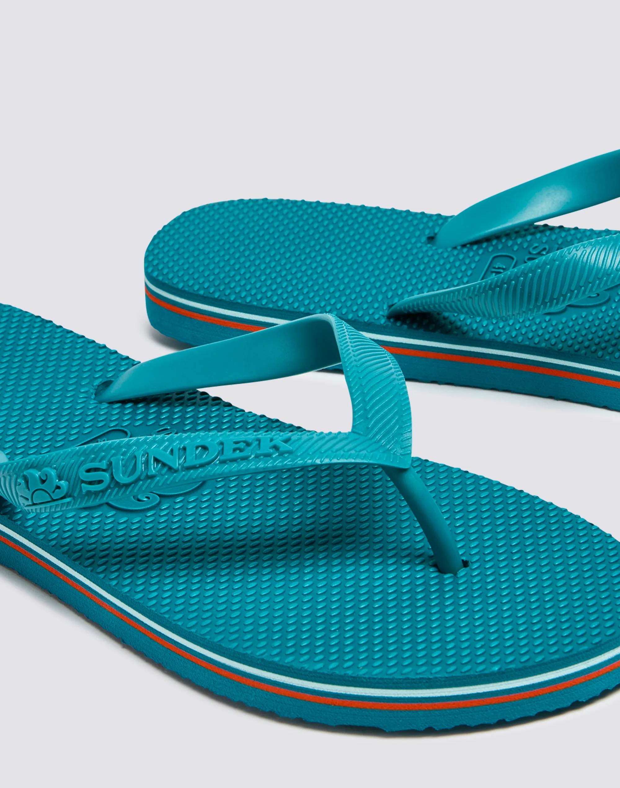 Rainbow-Accented Flip Flops;