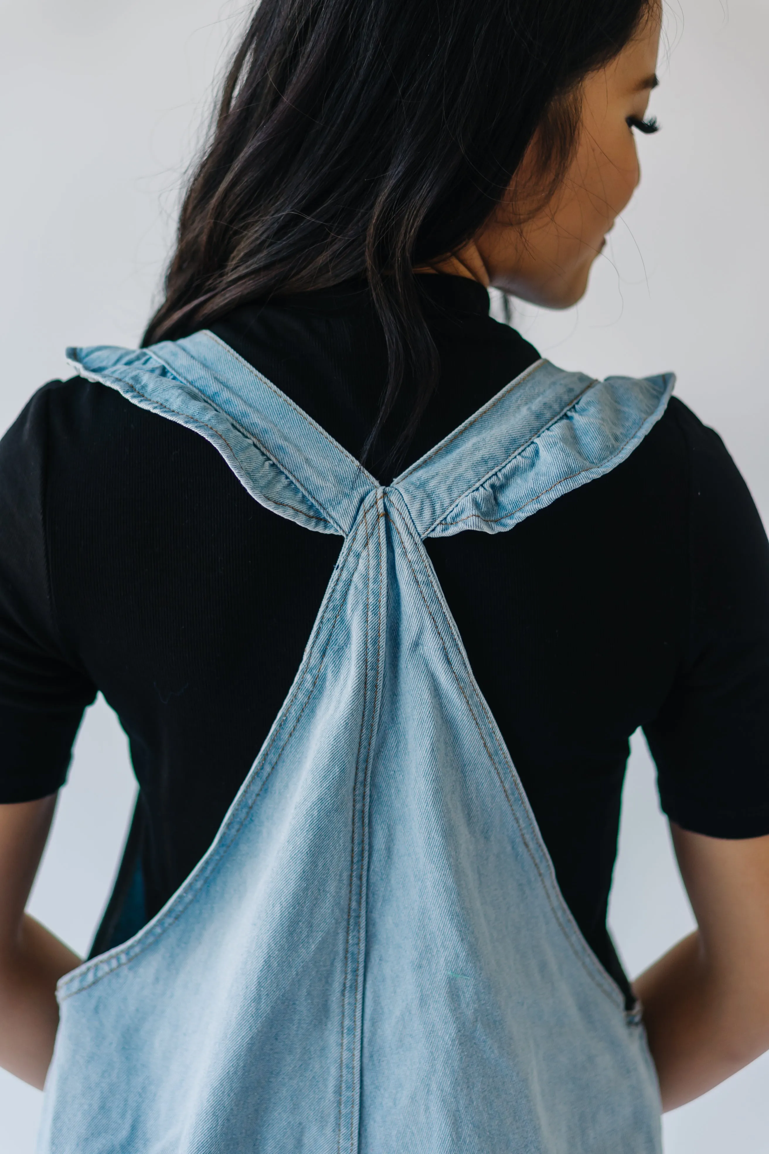 Denim Jumpsuit with Ruffle Detail from Redlands